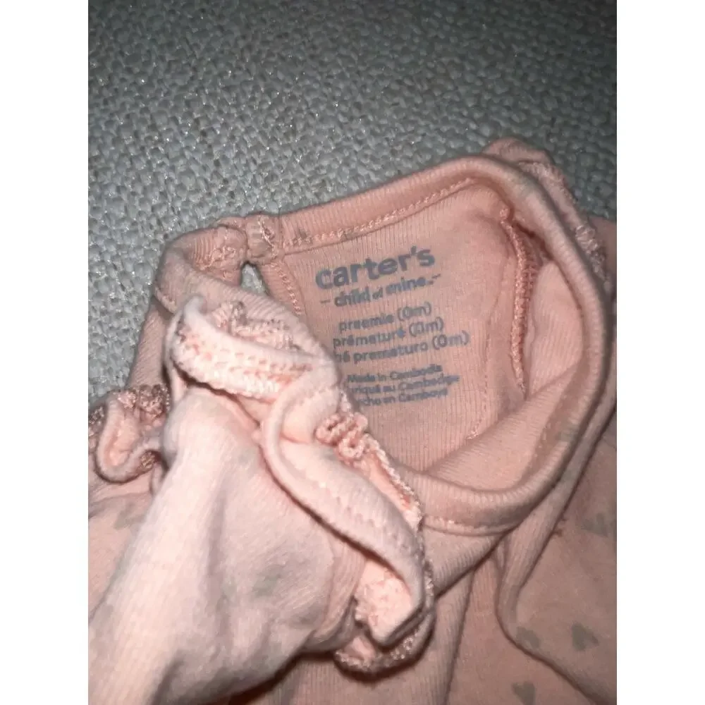 Carter’s Bundle of  4 (four) Preemie / newborn onesies.